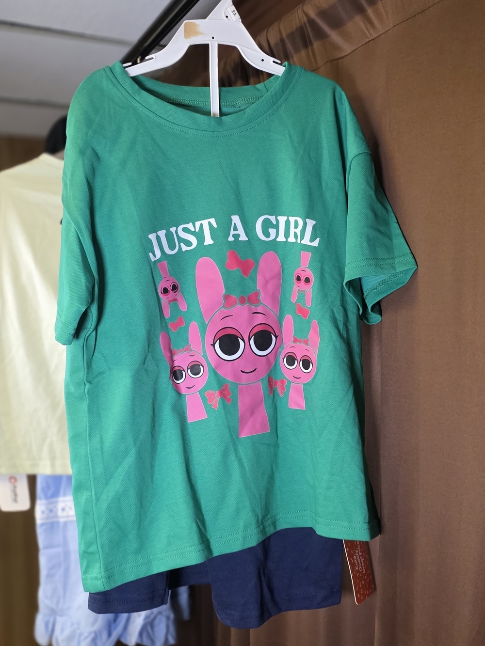 Just A Girl Green Graphic Tee with Pink Character Print